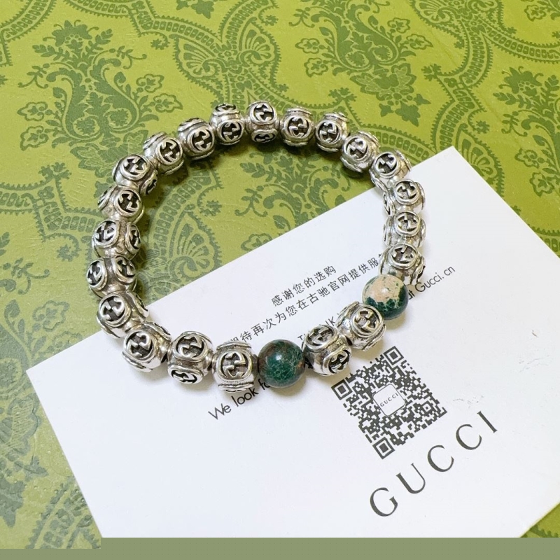 G*u*i bracelets